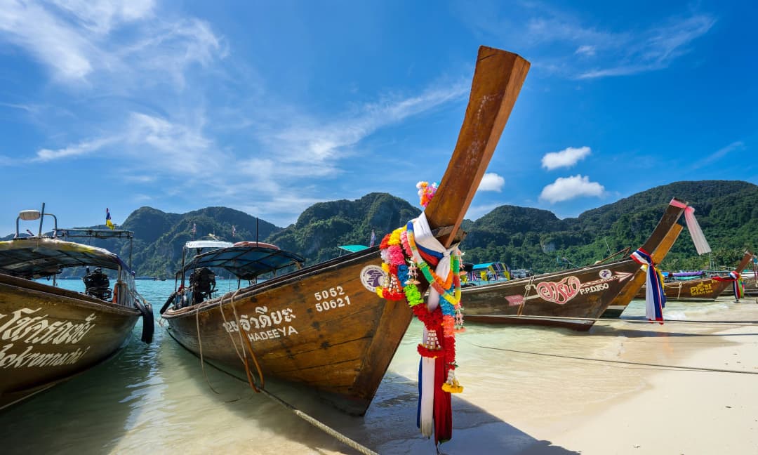 Long tail boats on Koh Phi Phi beach